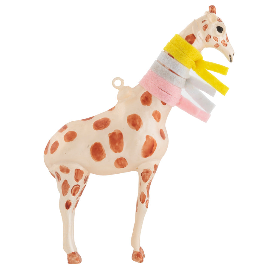 The slender neck of our spotted safari giraffe is bundled up, up, up with fuzzy winter scarves!