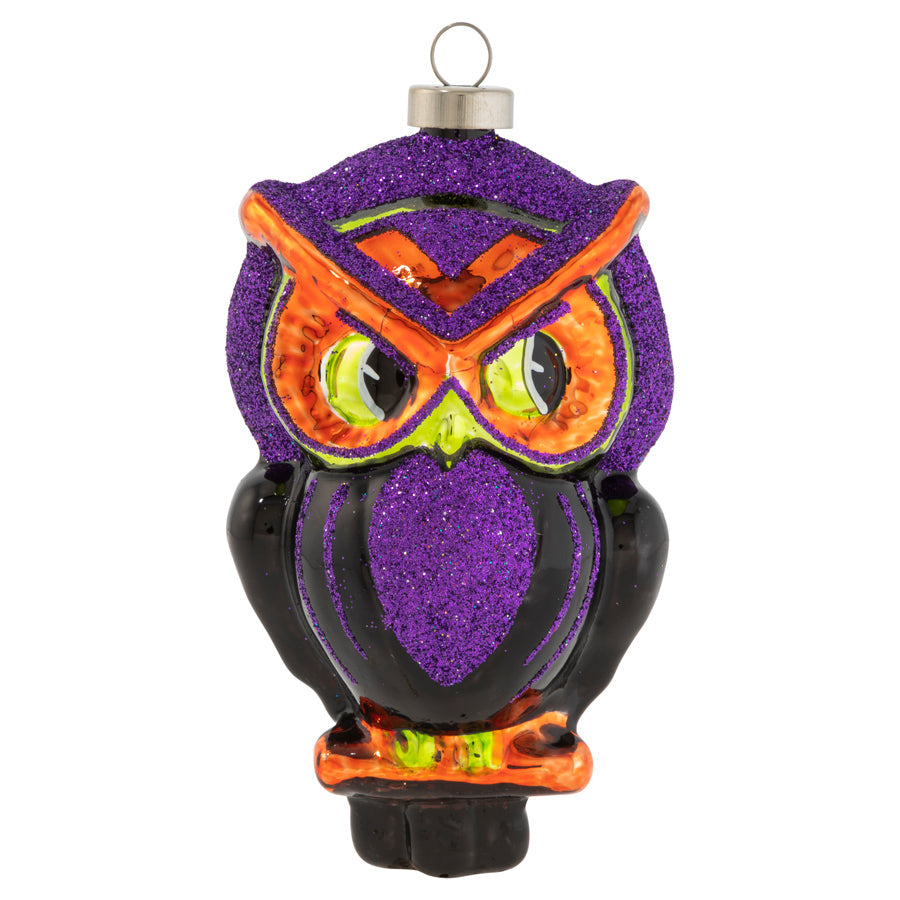 This hauntingly glittered owl will provide plenty of spooks when perched atop your tree!
