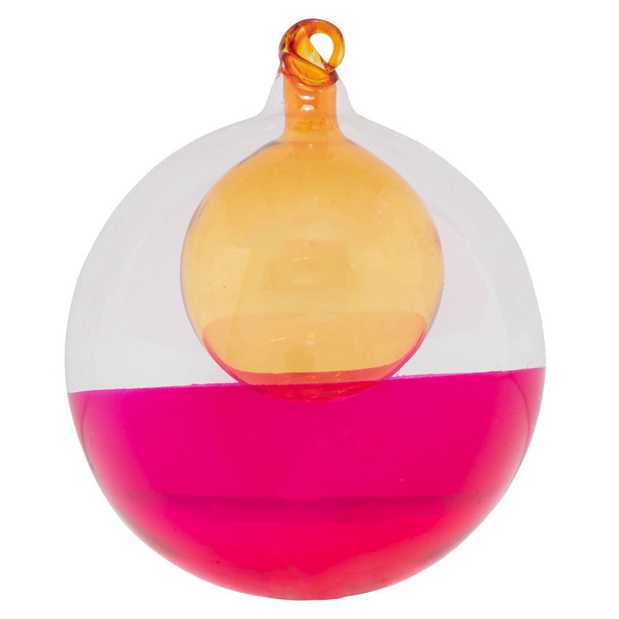 Perfect for the festive modern tree, this double blown glass ball features a golden globe encased in a color-blocked fuchsia bubble.