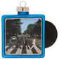 The enduring popularity of the Beatles’ Abbey Road cannot be overstated. Show your love for the Fab Four with this miniature album cover ornament.