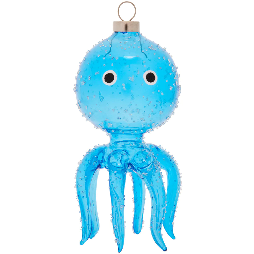 This bright blue octopus is looking cute and curious, with wide eyes and long tentacles.