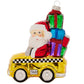 Santa's delivering presents around the city in his classic yellow-checkered taxi cab.